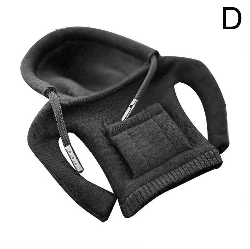 Cloth gear shift knob hoodie cover shown in multiple colours next to a car gear lever.