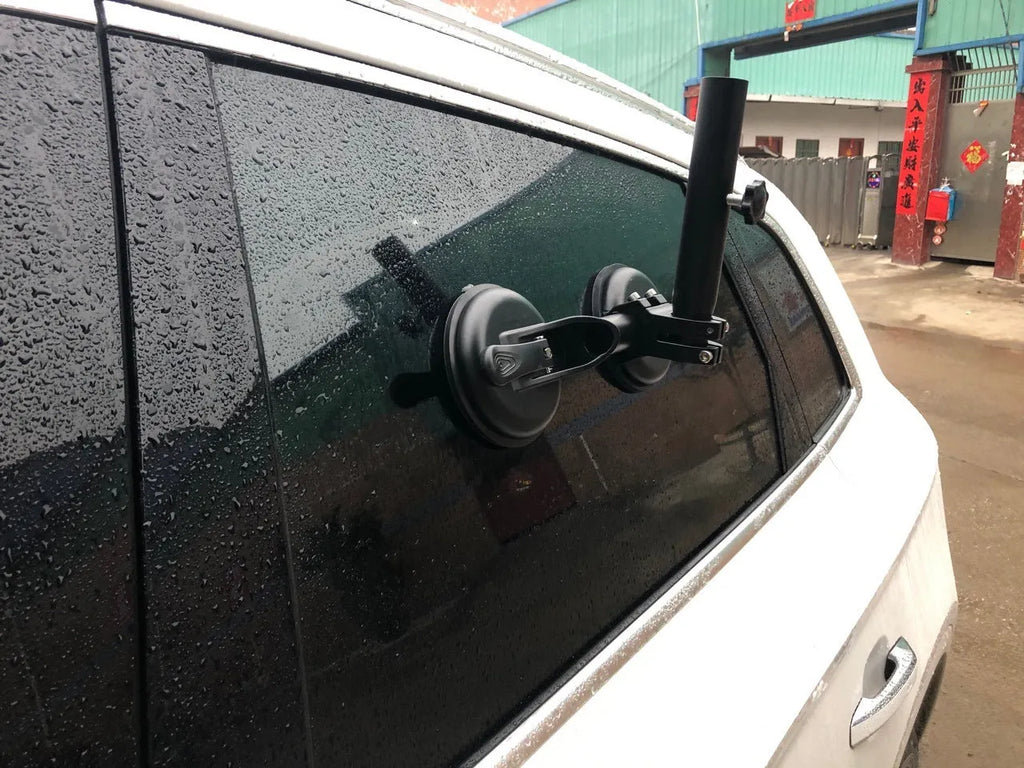 Black off-road car flagpole sucker base with round glass suction cup and rubber disc body.