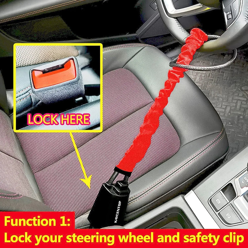 Red iron cable car steering wheel lock for General Motors vehicles on a black steering wheel.