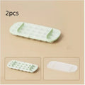 Food grade ice cube tray grid with leverage handle and blue color, showing shovel storage area and high capacity ice grid