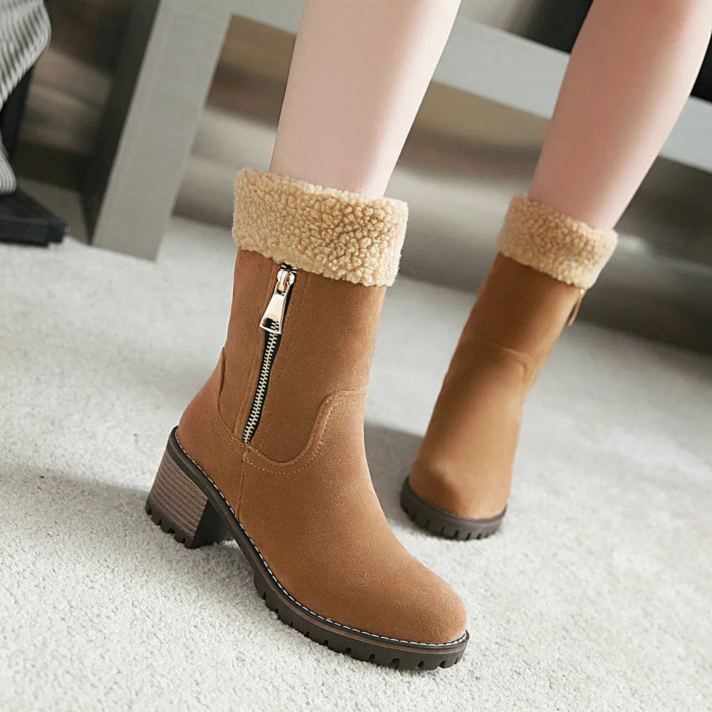 A pair of snow boots with a rubber sole and plush lining, shown in one of four available colours.