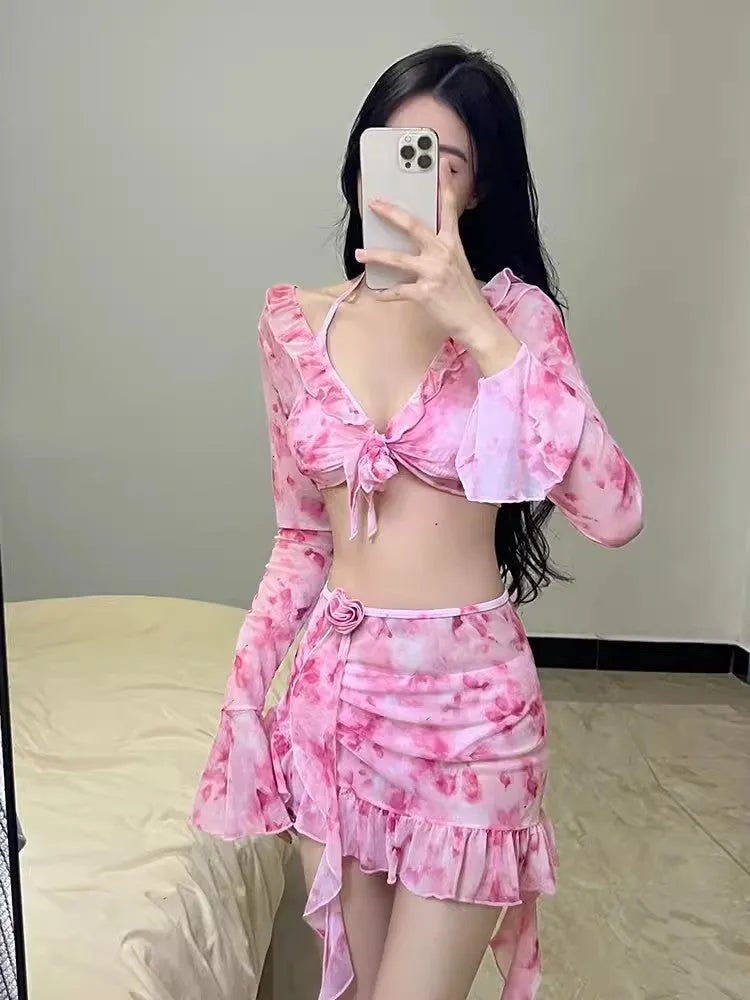 Women's cherry blossom pink floral print bikini set on a mannequin