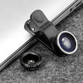 Smartphone with a silver clip-on lens attachment showing wide-angle, macro, and fisheye lenses.