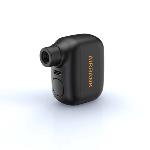 Black AS100 mini electric bike pump with USB charging cable and waterproof bag.