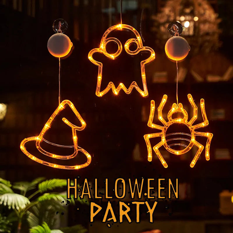 Seven Halloween LED window lights with spider, pumpkin, and ghost designs featuring suction cups for mounting