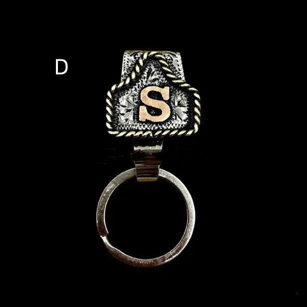 Handmade metal cow tag belt keychain in rustic design with multiple colour options