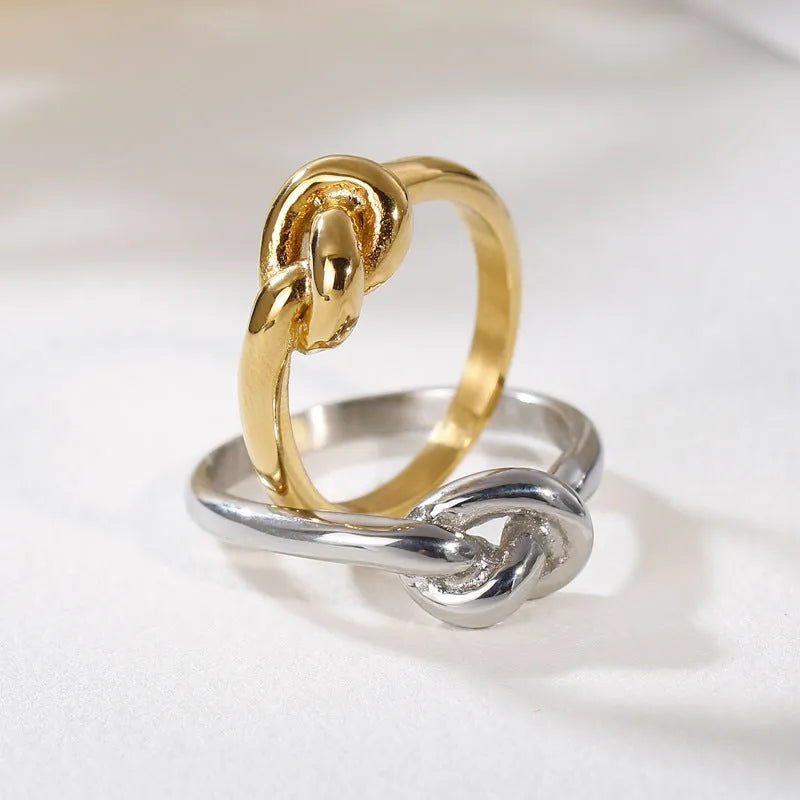Truelove knot geometric titanium steel ring in gold KR82086-K on white background
