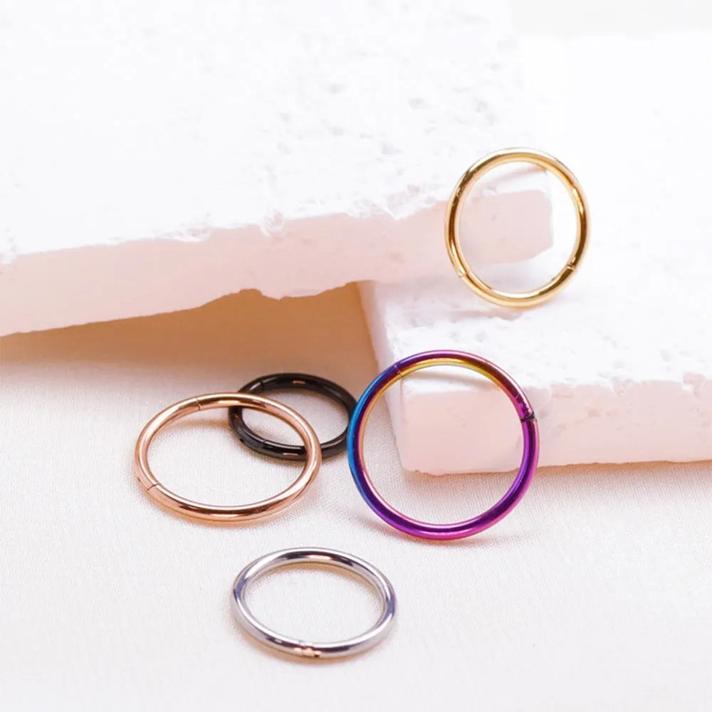 Titanium alloy nose ring with inlaid zircon, 1.2x12mm seamless round hoop in Diamond Gold