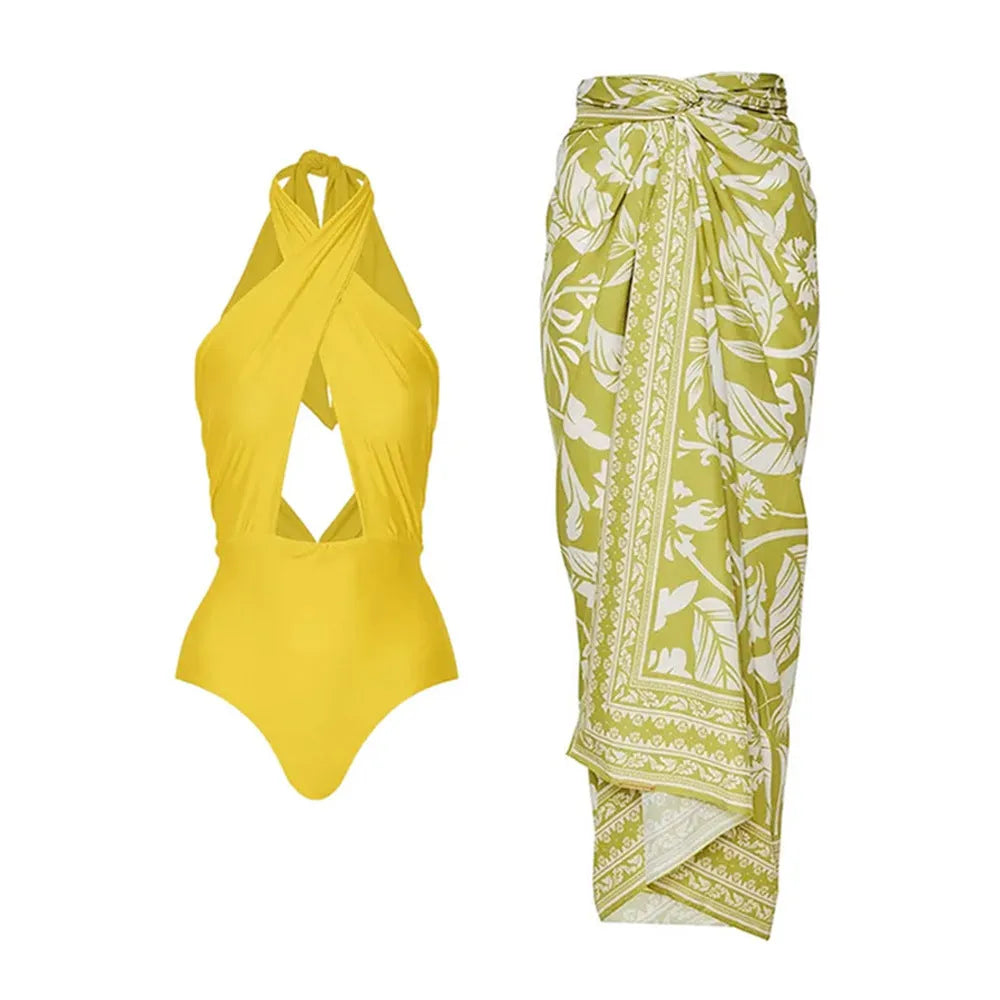 Women's halter neck one-piece swimsuit with coordinating wrap skirt in solid colour