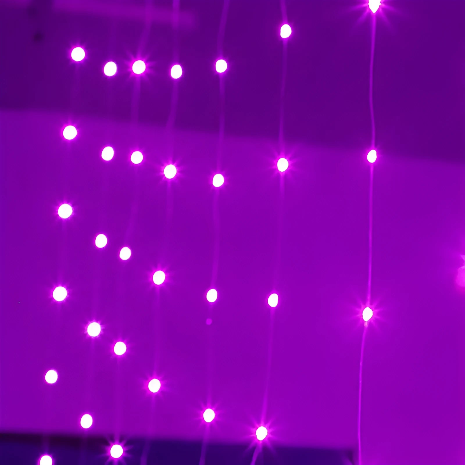 Copper curtain style LED Christmas lights powered by USB, available in blue, purple, warm white, or white.