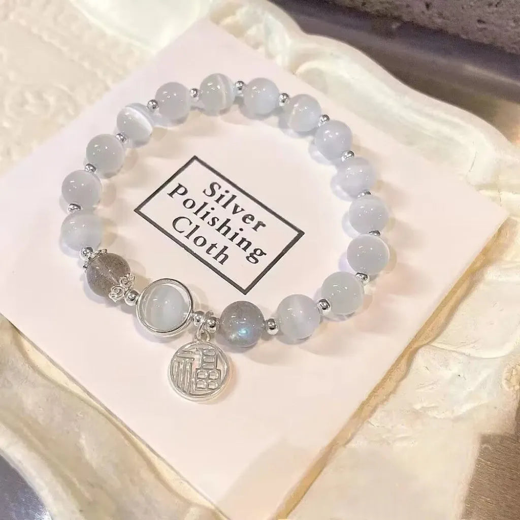 Glass bracelet with butterfly design and blessing card beads in moonlight colours