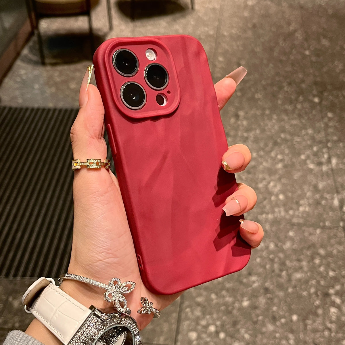 Advanced Skin Wrinkled Silicone Phone Case for iPhone 15 14 13 12 in black with textured wrinkle finish
