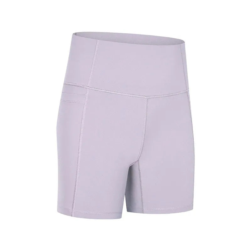 Women's tight-fitting super stretch sports shorts in a solid colour, shown on a model.