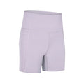 Women's tight-fitting super stretch sports shorts in a solid colour, shown on a model.