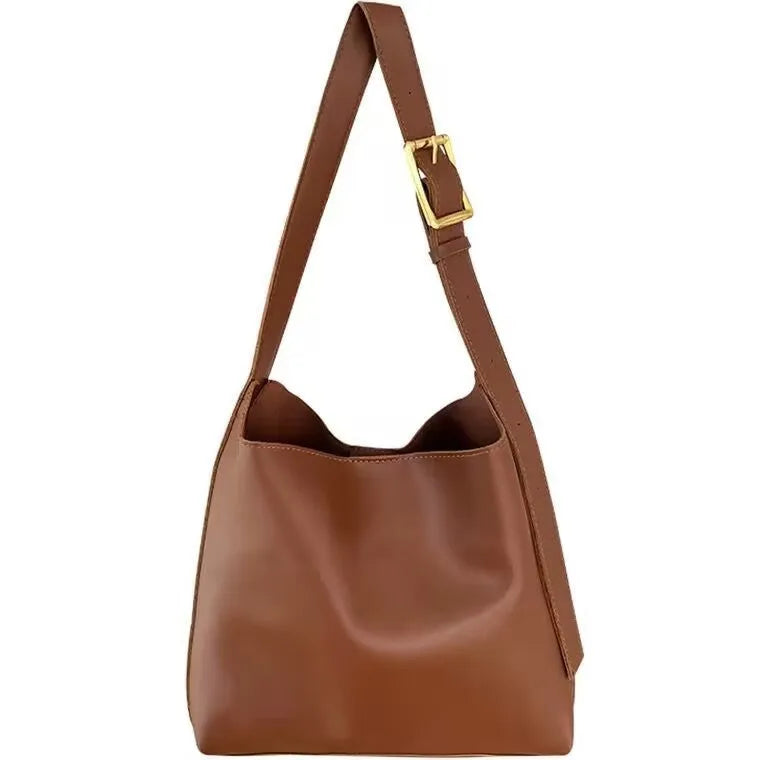 Ladies' shoulder bag with swing thread details in soft PU material showing black and brown colour options