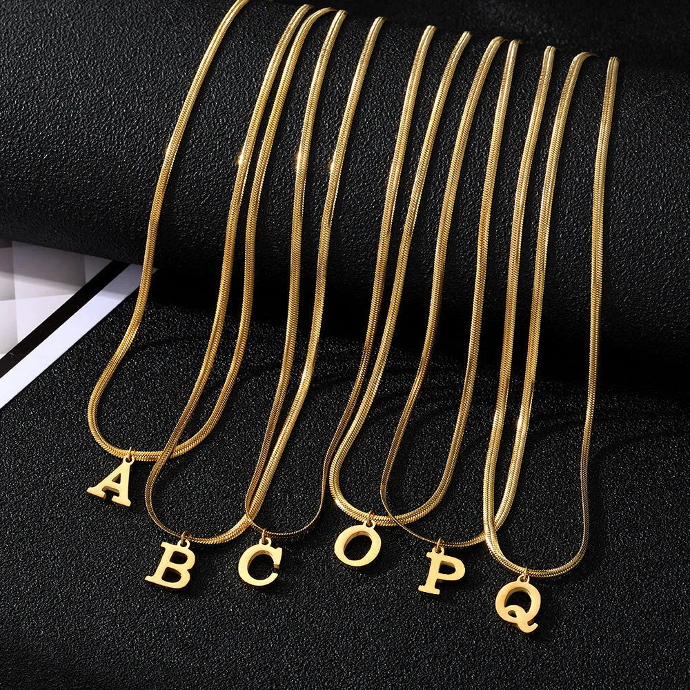 A-Z letter pendant necklace in titanium steel with gold colour snake bones chain, unisex initial jewellery