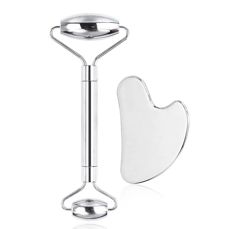 Stainless steel heart-shaped facial eye roller and double-headed massage scraping board set.