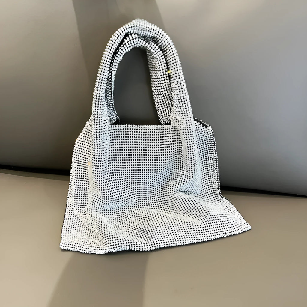 Silver rhinestone handbag with cotton thread body and open outer pocket for dinner and party use