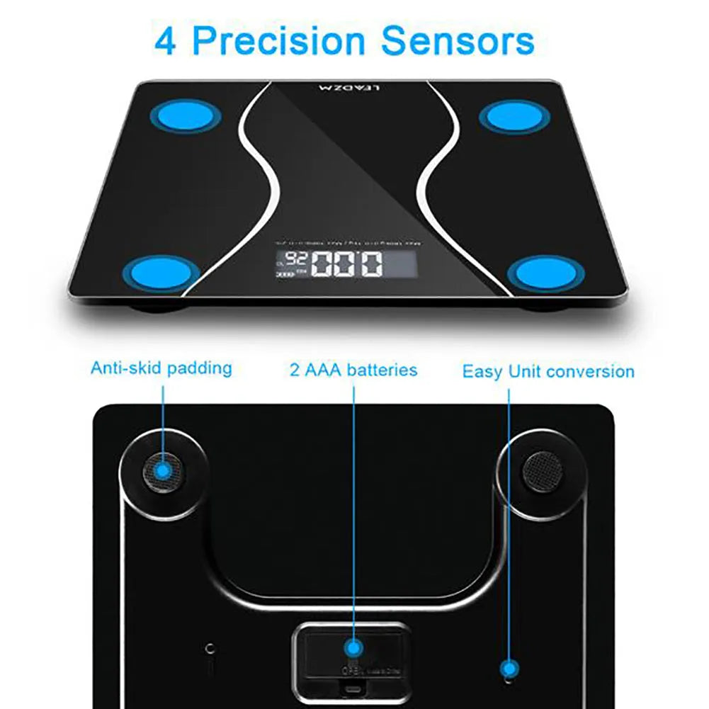 Black electronic bathroom scale on a flat surface showing digital display.