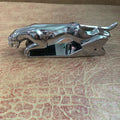 Car Leopard mobile phone holder with rotating bracket in black finish mounted on car dashboard