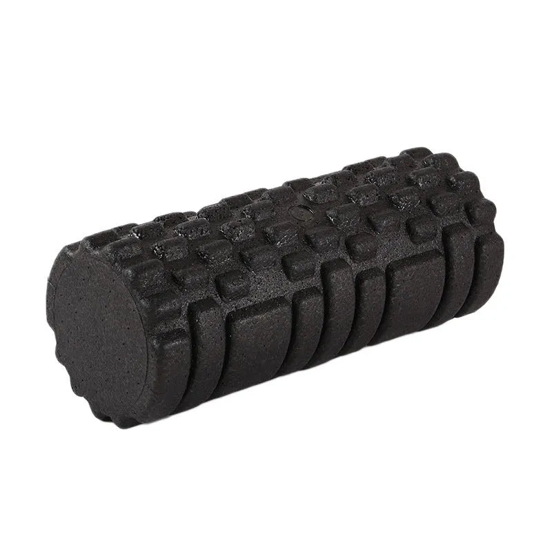 Hollow black EPP foam roller 33x14cm on a white background for Pilates and balance exercises