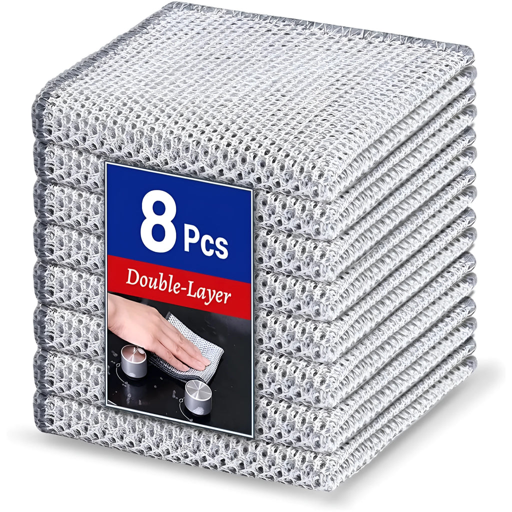 Silver wire and microfiber scouring pad cloth for cleaning pots and bowls on a kitchen counter.