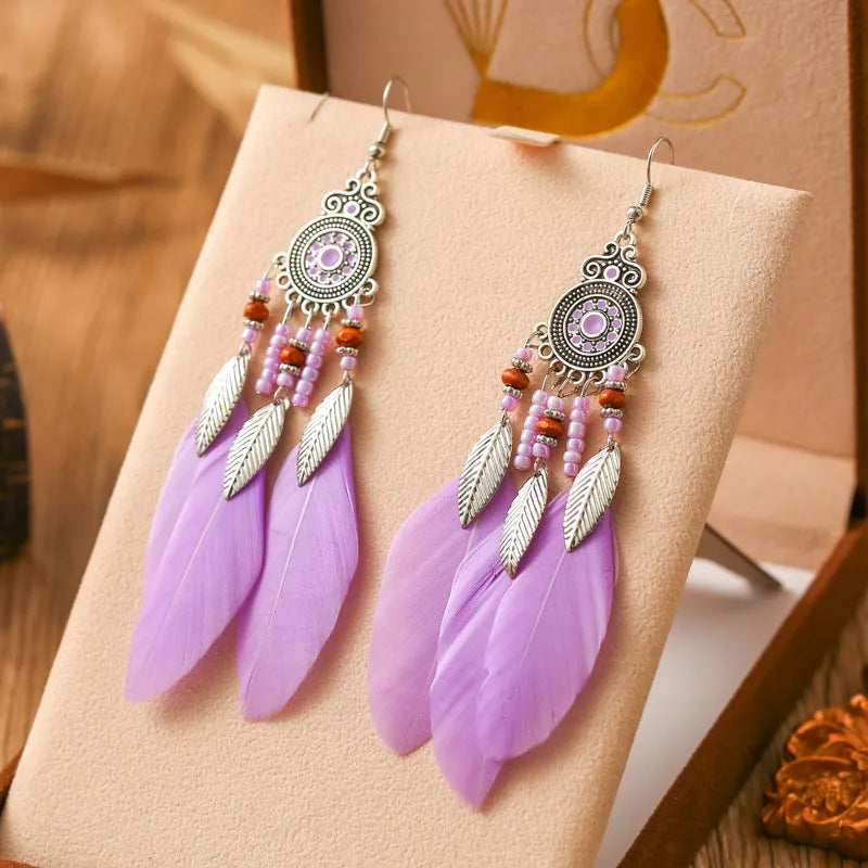 Round drop feather earrings with leaf pattern in alloy metal, available in multiple colours