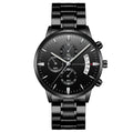 VA VA VOOM men's stainless steel quartz watch with black dial and silver chain, showing calendar feature.