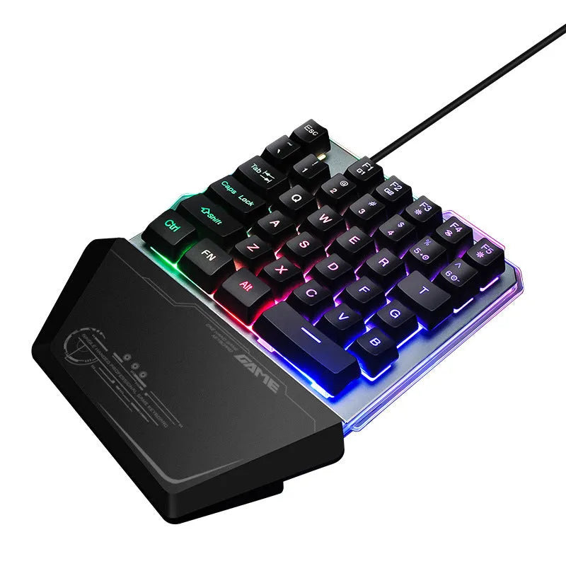 Black G40 Flow one-handed mechanical gaming keyboard with RGB backlit keys on a desk.