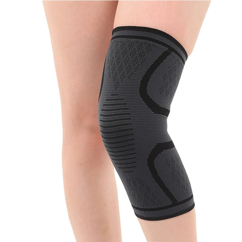Pair of black stretch polyester sports knee pads with a textured non-slip interior.