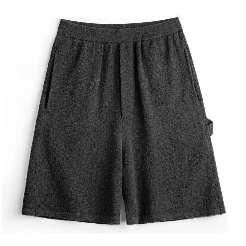 Cement grey American-style loose profile straight-leg sports shorts with elastic waistband