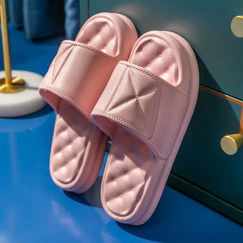 A pair of thick-soled EVA foam bath sandals in a chosen colour, showing the non-slip sole pattern.