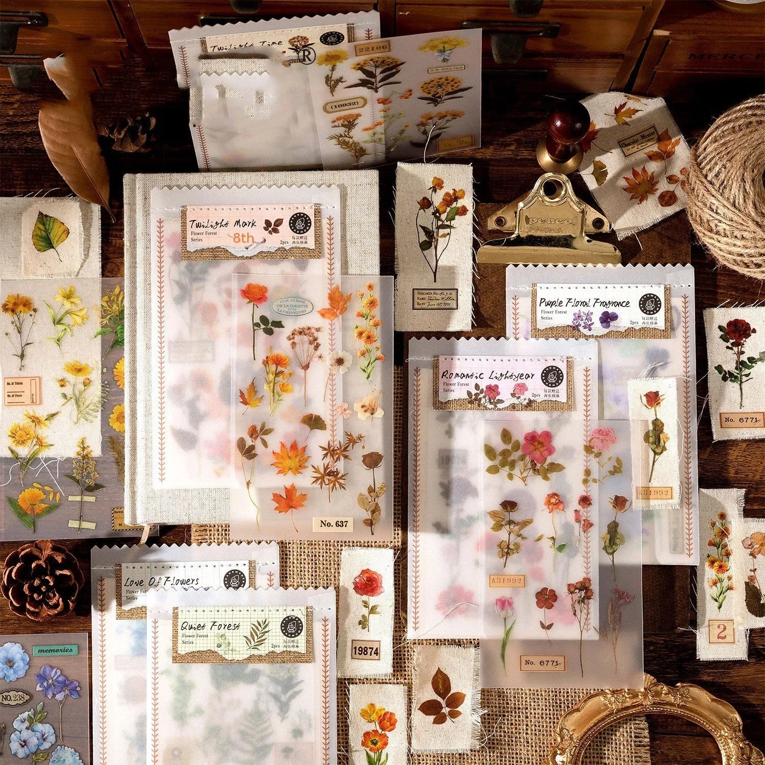 Huazhisen Series art sticker pack showing forest-themed label designs on transfer paper and cotton linen sheets.