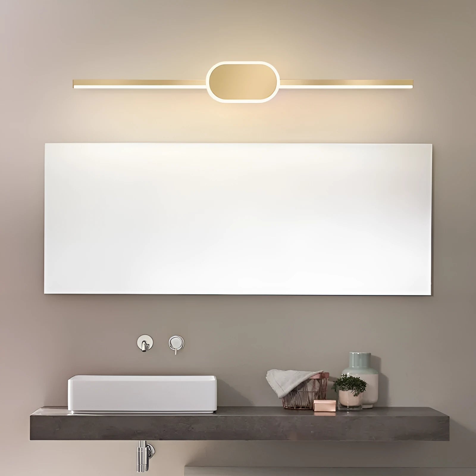 Gold-framed rectangular bathroom mirror cabinet with integrated LED light strip around the edge.
