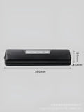 Small black automatic vacuum sealer machine for household food preservation with compact design