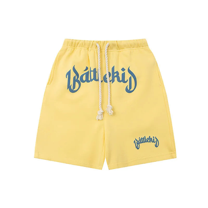 Casual cotton blend street shorts in a loose, cropped sweatpants style on a grey background.