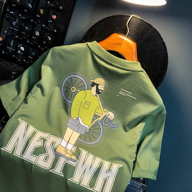 Men's green loose-fit short sleeve t-shirt with printed design on fabric, laid flat to show size.
