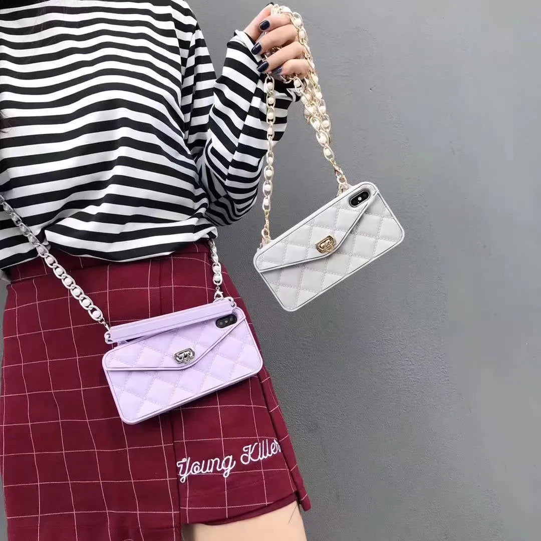 Luxury silicone mobile phone case with pearl chain lanyard for iPhone models in multiple colours