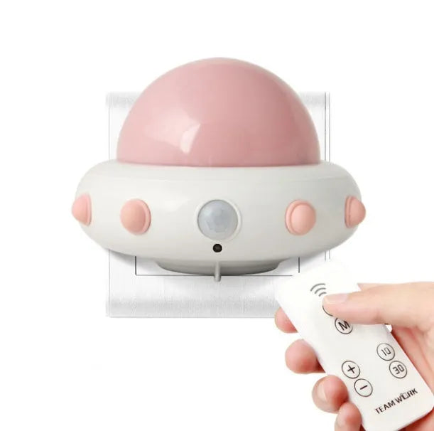 Remote control UFO shaped bedside night light in blue, pink, or white colour options