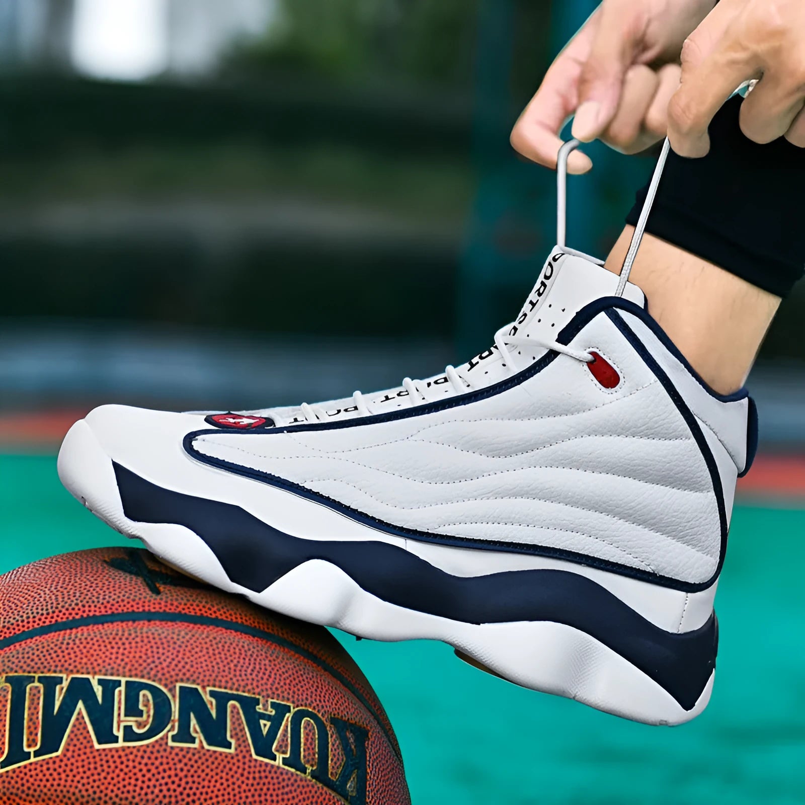 Men's high-top basketball shoes in AJ13 white and red colourway with rubber sole and mesh upper