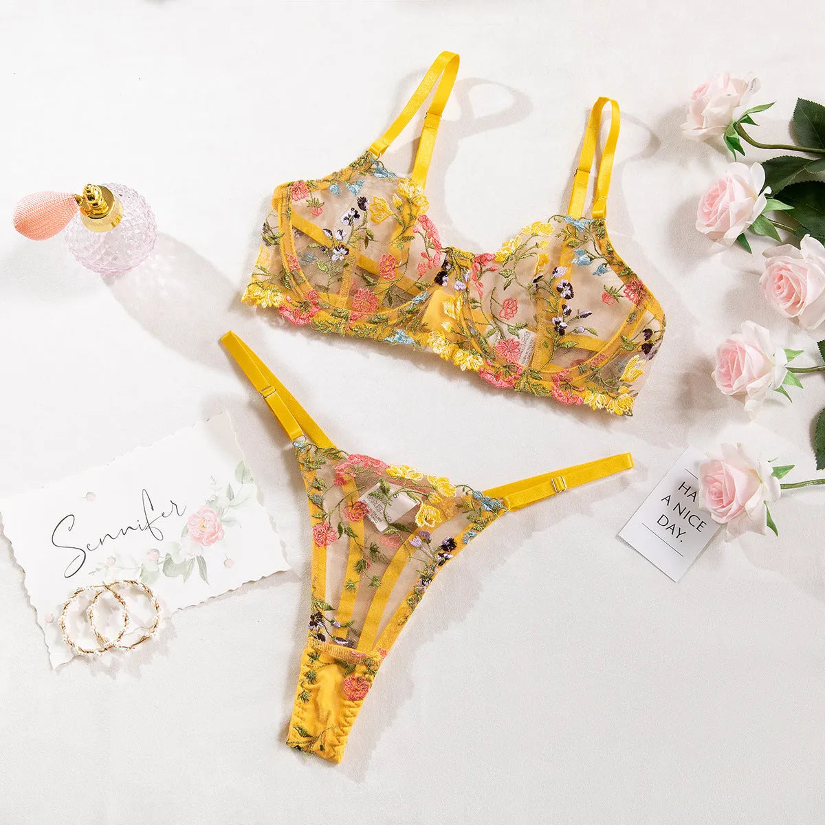 Floral mesh bra with steel ring T-back design in skin colour showing 3/4 cup construction