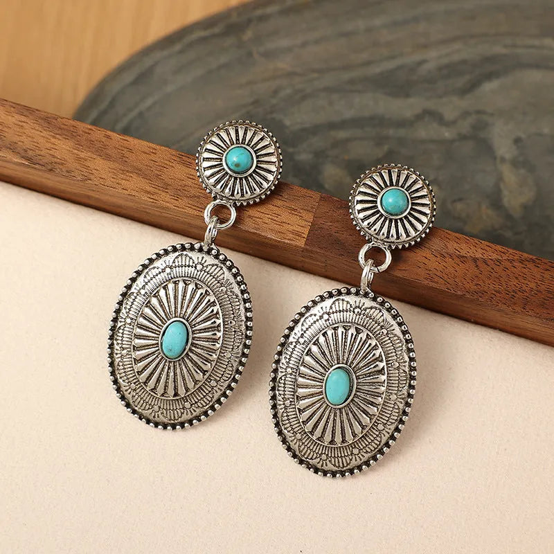 Silver-turquoise alloy drop earrings with retro pumpkin flower design and electroplated finish.