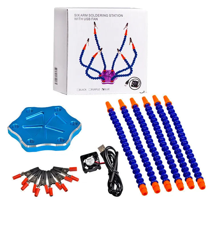 Black aluminium alloy six-claw welding station with multiple adjustable arms on a workbench.