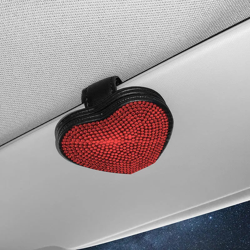 Black PU leather car sun visor clip with magnetic closure for holding sunglasses.