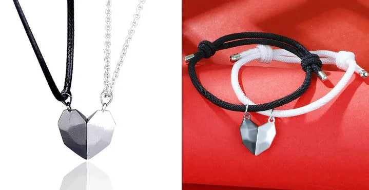 Gold-plated magnetic faceted heart pendant necklace in black and white on display