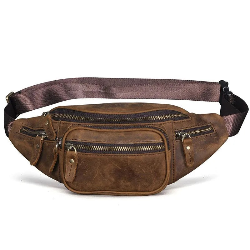 Retro brown leather messenger bag with a single shoulder strap shown open.