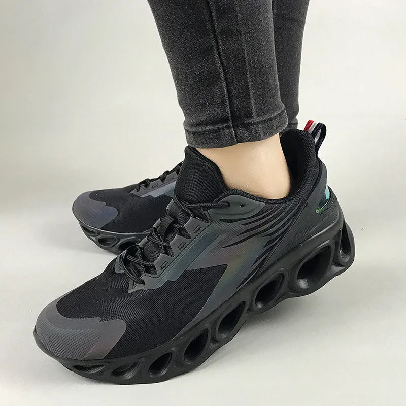 Men's casual mesh sneakers with EVA sole in black colour showing lace-up design and round toe