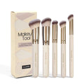 MAANGE apricot-coloured angled blush brush and four other makeup brushes from the five-piece set.