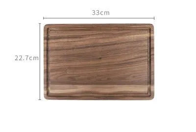 Black walnut wood cutting board with juice groove and side handle