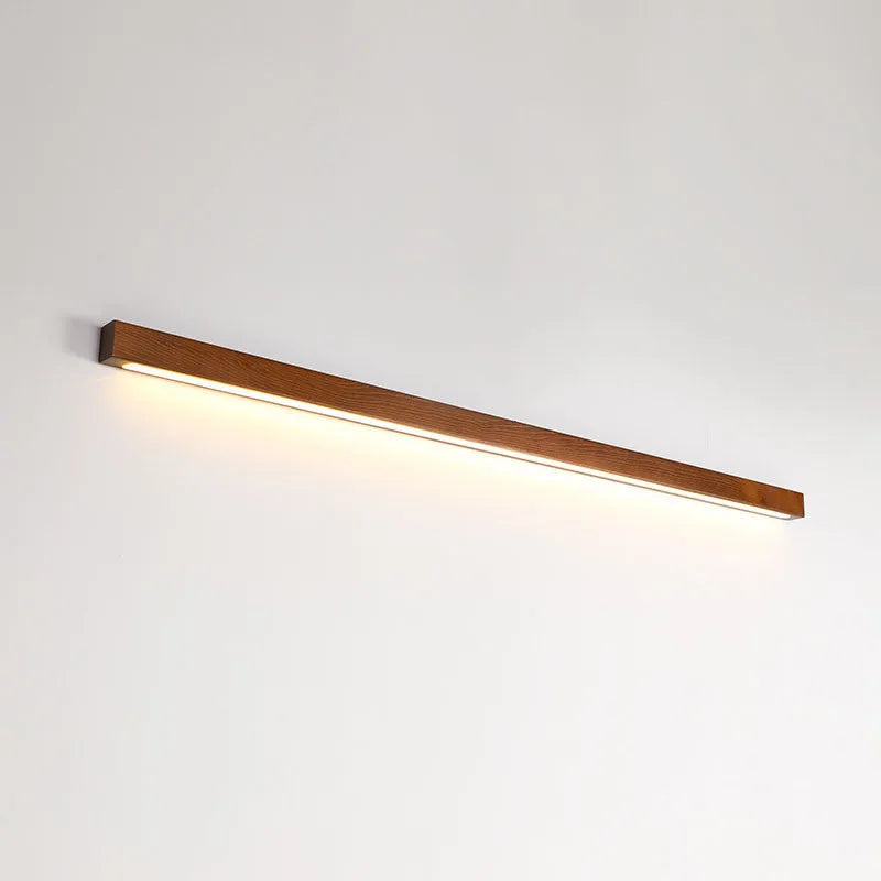 Wooden log strip wall lamp with LED lighting in walnut finish